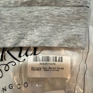 Brand new in bag sports bra. Very small, XS. Pre-teen size sports bra. Gray